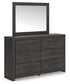 Hollivern Queen Panel Bed with Mirrored Dresser and Nightstand