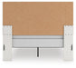 Zuraleus Queen Upholstered Panel Bed