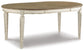 Realyn Dining Table and 8 Chairs