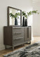 Arkenton King Panel Bed with Mirrored Dresser