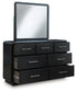 Rowanbeck Queen Upholstered Panel Bed with Mirrored Dresser and Nightstand