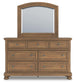 Feddinger Queen Storage Sleigh Bed with Mirrored Dresser