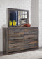 Drystan Queen Panel Bed with 2 Storage Drawers, Dresser, Mirror, Chest and Nightstand