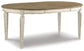 Realyn Dining Table and 8 Chairs