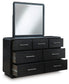 Rowanbeck California King Upholstered Panel Bed, Dresser, Mirror and Nightstand