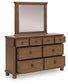 Chadworth Queen Poster Bed with Mirrored Dresser
