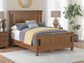 Chadworth Queen Poster Bed with Mirrored Dresser