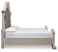 Andonhall King Upholstered Panel Bed with Mirrored Dresser and Nightstand