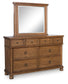 Chadworth California King Poster Bed with Mirrored Dresser