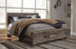 Derekson King Panel Bed with Mirrored Dresser and Chest